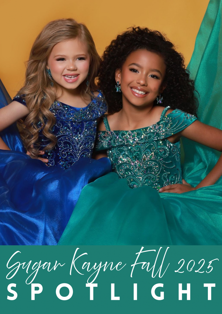 Two young girls smiling in glamorous Sugar Kayne Fall 2025 pageant gowns, one in a sparkling royal blue ball gown and the other in a teal green beaded gown, showcasing the Fall 2025 Spotlight collection.